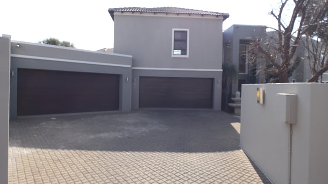 This four-bedroom, two bathroom home in upmarket Meyersdal is for sale through Harcourts for R4,199m. It has a spacious open-plan kitchen and living area leading out to a covered entertainment patio, a pool and two double garages.